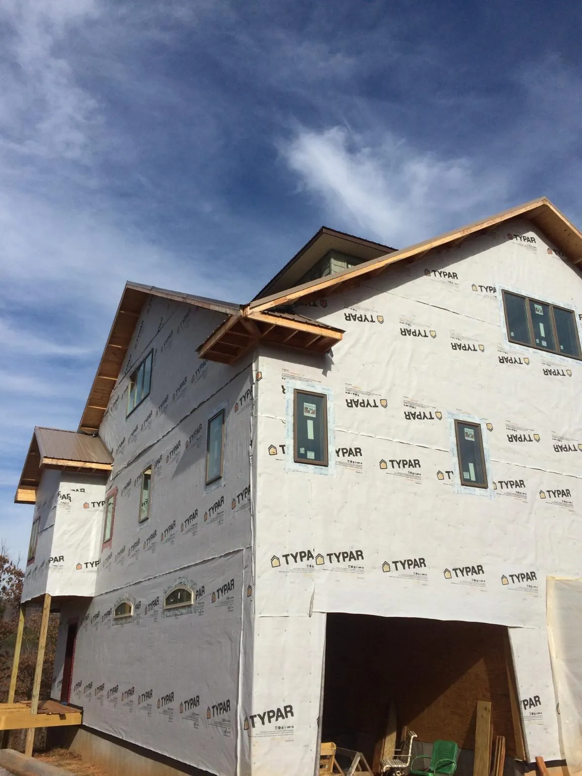 Stick built house wrapped in Typar with new roof framing and dormers in Davenport